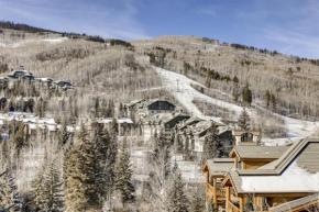 Upscale Ski in, Ski out 1 Bedroom Mountain Vacation Rental with Access to Outdoor Heated Pool, Hot Tubs, and Private Ski Lockers